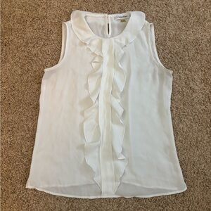 White sleeveless blouse